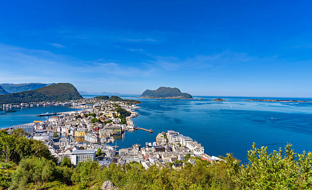 Alesund skyline and fjord landscape under sunny summer daylight in western Norway