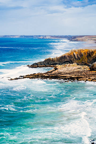 Waves breaking at Cap de la Chevre on a windy day in the Brittany region of France.