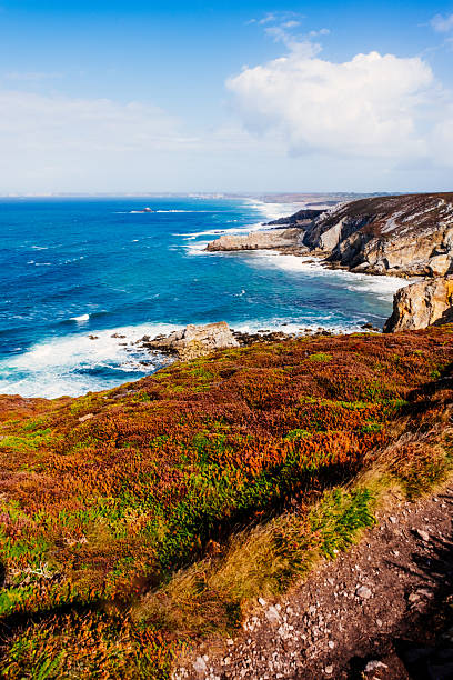 Waves breaking at Cap de la Chevre on a windy day in the Brittany region of France.