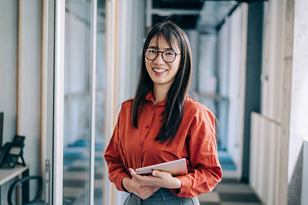 istock Confident businesswoman in modern office. 2242169734