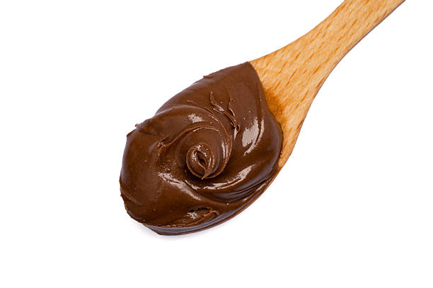 istock Cream chocolate with spoon on a white background 2242174034