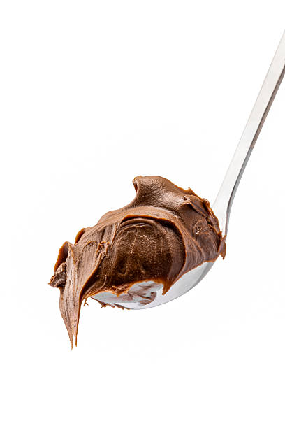 istock Cream chocolate with spoon on a white background 2242174066