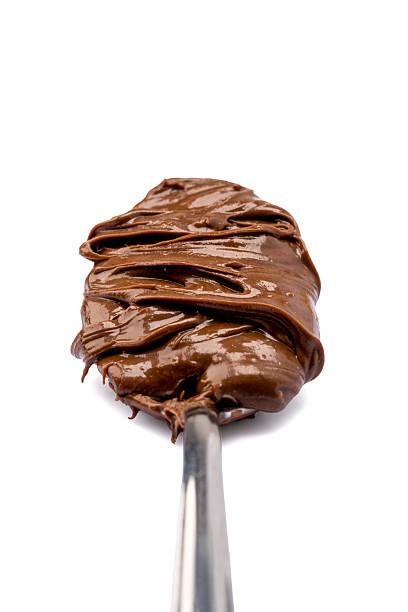 istock Cream chocolate with spoon on a white background 2242174068