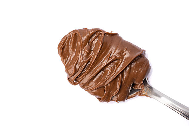 istock Cream chocolate with spoon on a white background 2242174075