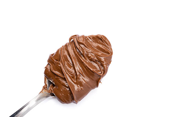 istock Cream chocolate with spoon on a white background 2242174091
