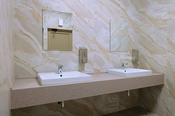 istock Public washroom. Two washbasins in the restroom. 2242174304