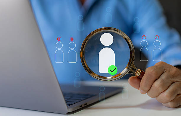 istock Person pointing selected candidate with check mark, recruitment and hr employee selection, human resource management and corporate hiring process, job screening strategy for workforce, HR outsourcing 2242175681