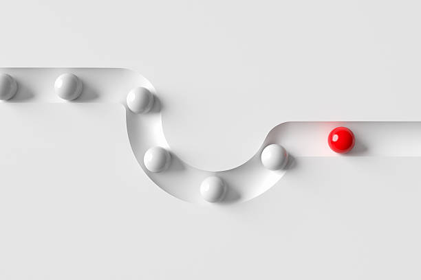 istock Red ball taking shortcut passing other white balls on curved path 2242178074