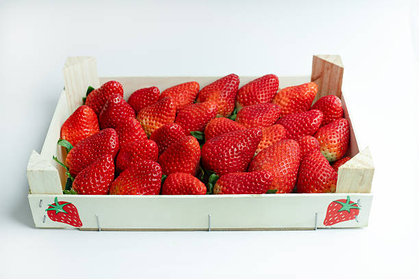 istock Fresh Strawberries in Wooden Crate 2242180924