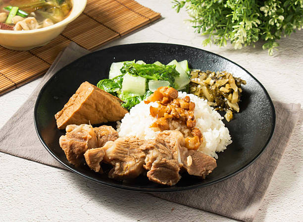 Taiwanese cuisine Pork cartilage bento with this inviting pork rib rice bowl. Perfect for showcasing comfort food, culinary traditions, and the joy of a delicious, satisfying meal.