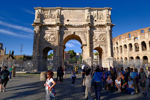 Rome,Italy-Sep.25th 2025: Arch of Constantine in Rome with tourists