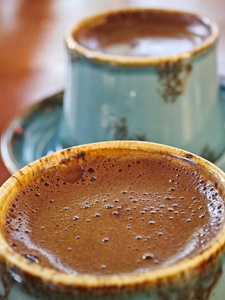 Traditional Turkish Coffee Served in Rustic Blue Ceramic Cups