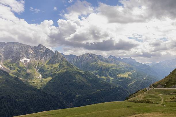 istock Scenic mountain view with clouds and road. 2242195344