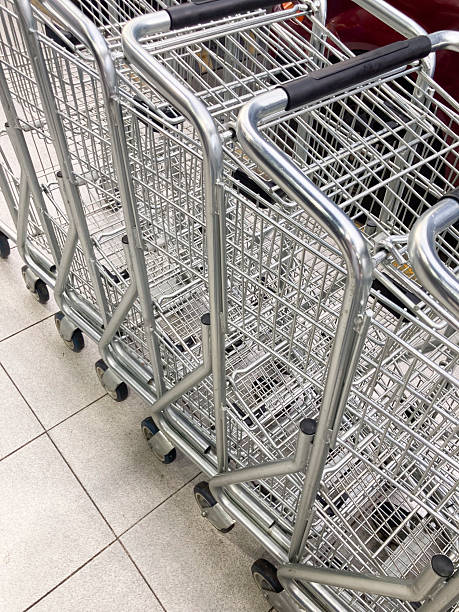 View of group of metal shopping cart at supermarket