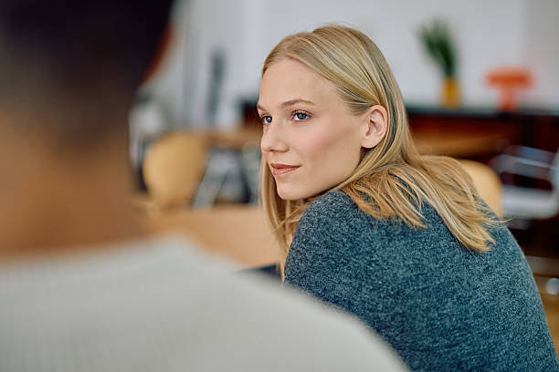 istock Young woman listening intently during a conversation 2242196920