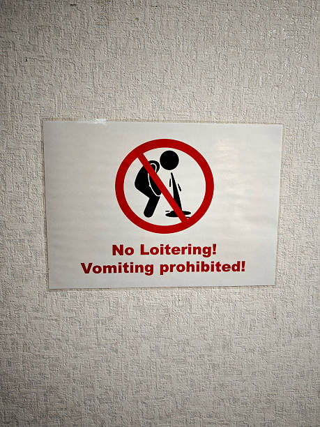 No Loitering! Vomiting prohibited sign outside a bar in Shinsaibashi, a busy nightlife district in Osaka, Japan