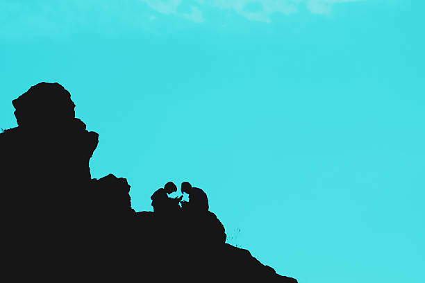 Hiker on the top of the mountain peak.