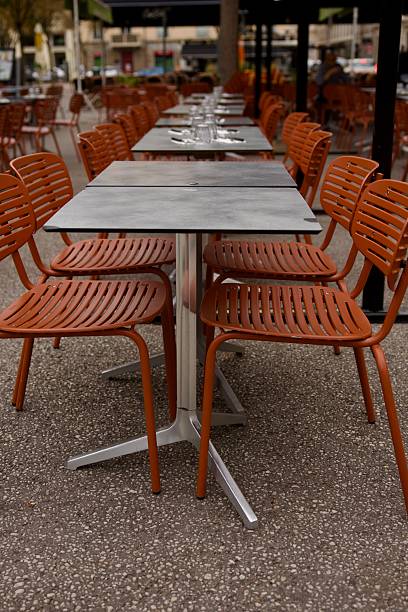 istock Tables and chairs on the outdoor patio 2242209008