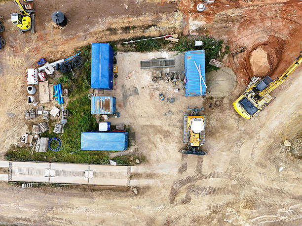 istock Aerial View of Construction Site with Excavators and Heavy Machinery 2242209421