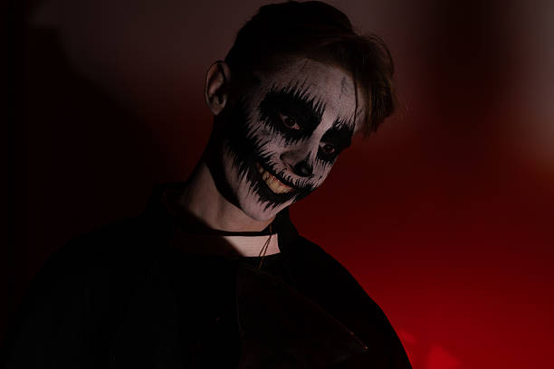 istock the skeleton makeup artist is ready for Halloween. 2242209487