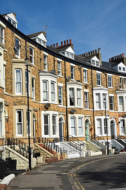istock Typical English Victorian terraced housing 2242209606