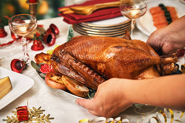 istock Roasted Holiday Goose with Vegetables for Christmas Dinner 2242215214
