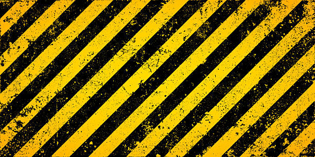 istock Warning sign with yellow and black diagonal lines. Attention, danger or caution symbol. Construction site signage, road safety notice, hazard banner, security alert shield. Vector illustration 2242219650