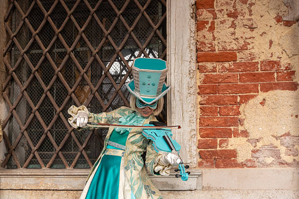 Venice, Italy - March 6, 2011: Two participant in costumes during the Carnival of Venice. The 2011 carnival was held from February 26th to March 8th