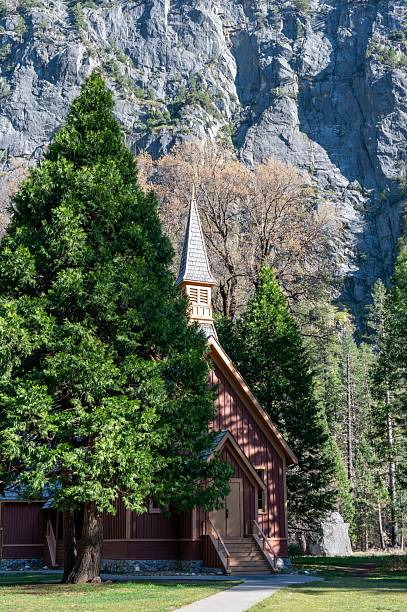 istock Chapel amidst trees and mountain in Yosemite. 2242224830