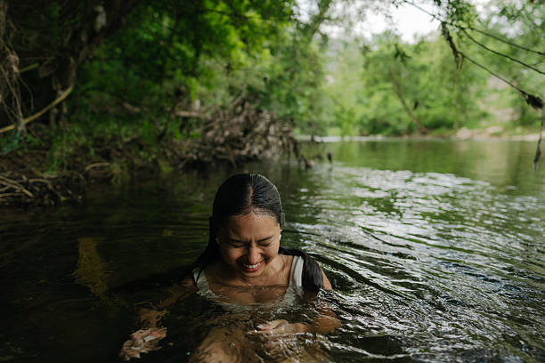 istock Swimming in the river 2242227365