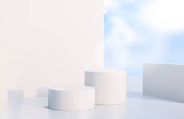 istock White podium stages on blue sky background with soft clouds - minimalist product display platforms for cosmetics showcasing, ecommerce clean branding presentations or modern advertising mockups. 2242229268