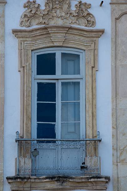istock Ornate vintage window with intricate ironwork. 2242234891