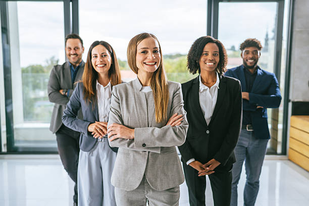 istock Diverse business team standing confident in modern office 2242238639