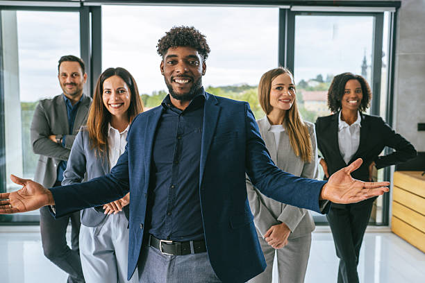 istock Diverse business team welcoming clients in modern office 2242238646