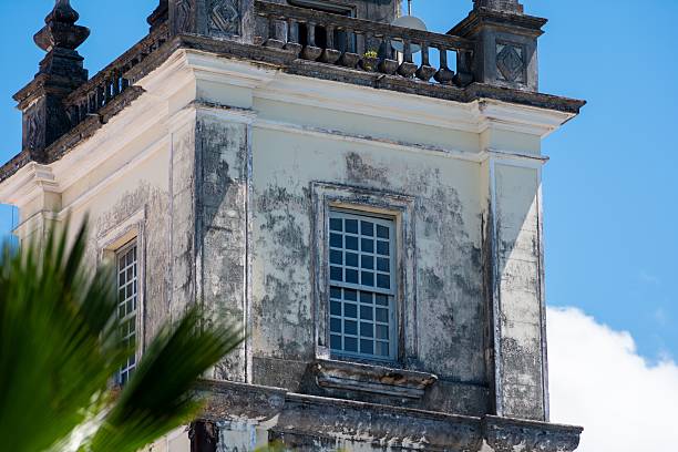 istock Weathered Building Facade with Palm Leaves 2242240764