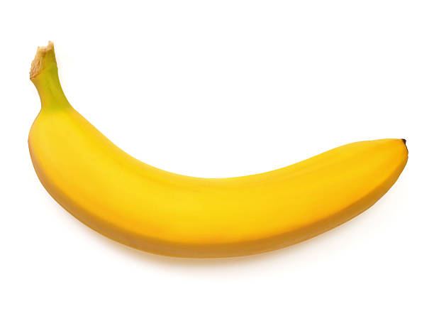 One banana isolated on white background. Top view, flat lay