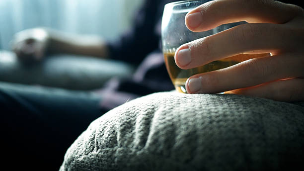 istock Alcoholic Drinks Whiskey on Reclining Chair 2242254915