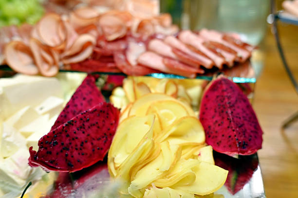 dining table with assorted foods, party foods food buffet