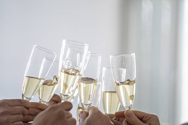 istock Friends toasting with champagne flutes at a celebration 2242269932