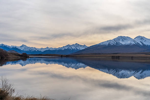 istock Mirror image reflections on alpine Lake Clearwater 2242272357