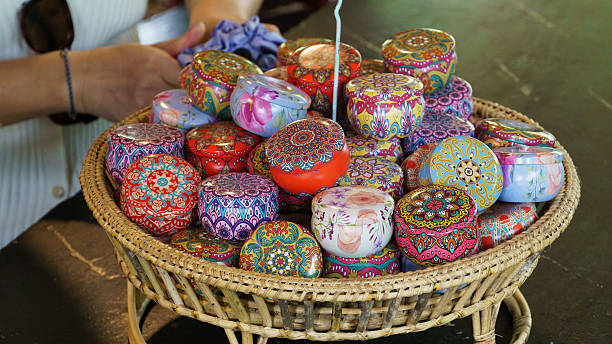 istock A Collection of Colorful Decorative Jars Arranged Beautifully Inside a Basket for Display Chiang Mai 2242276339