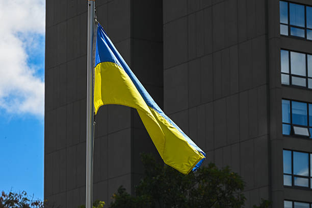 istock National flag of ukraine flying 2242277528