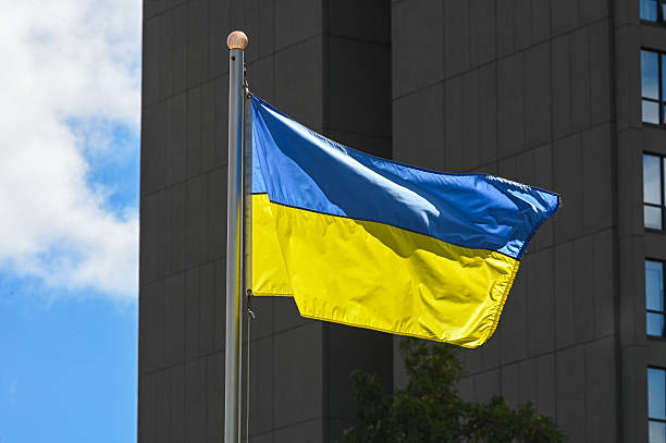 istock National flag of ukraine flying 2242277533