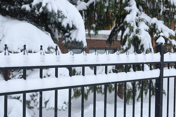 istock Snowy Black Fence Scene 2242277653