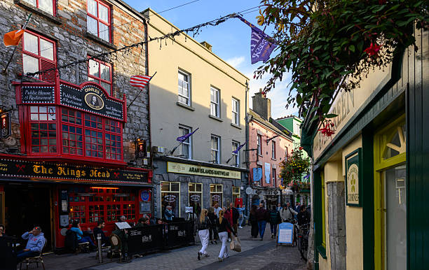 Galway, Ireland- Oct 6, 2024: The pedestrian zone in Galway, a hub for locals and tourists alike, is a vibrant, bustling area in the city center, known for its lively atmosphere, historic charm, and cultural significance.