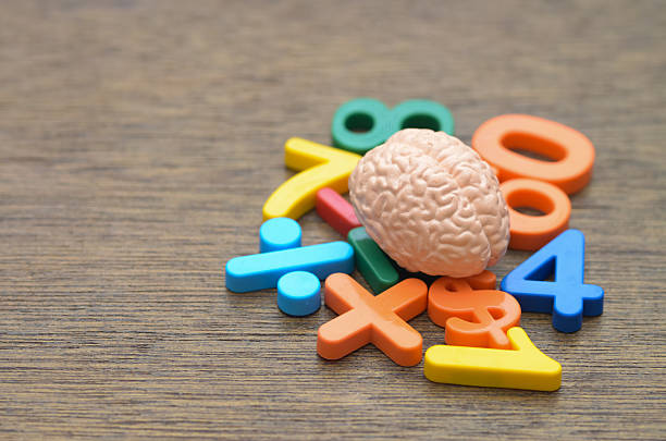 istock A human brain model surrounded by colorful numbers and symbols, representing cognitive function, calculation, and logical reasoning. 2242278782