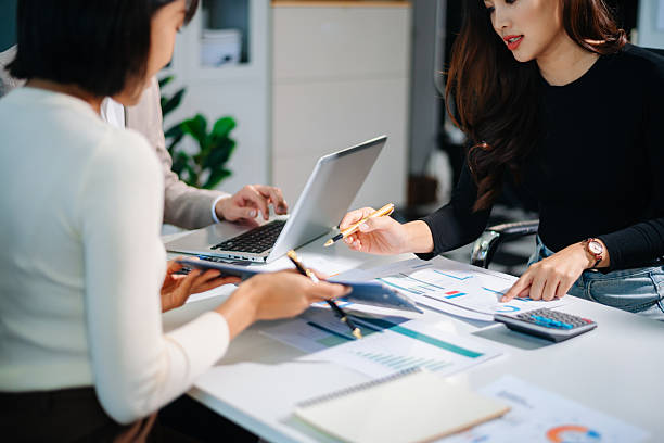 istock Business team collaboration discussing working analyzing with financial data and marketing growth report graph in team, presentation and digital tablet, laptop. 2242281275