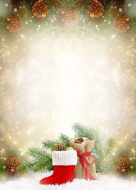 istock Christmas background with Santa's boot and gift bag, branch and cones for tree decoraton. New Year winter holidays card with decor and copy space. 2242286405