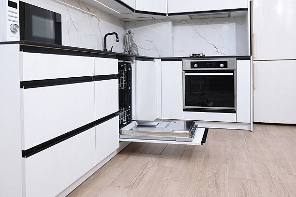 istock Open clean empty dishwasher in kitchen. Home appliance 2242288913