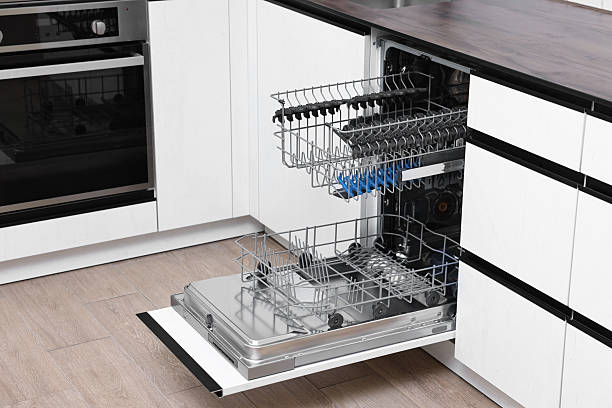 istock Open clean empty dishwasher in kitchen. Home appliance 2242288959